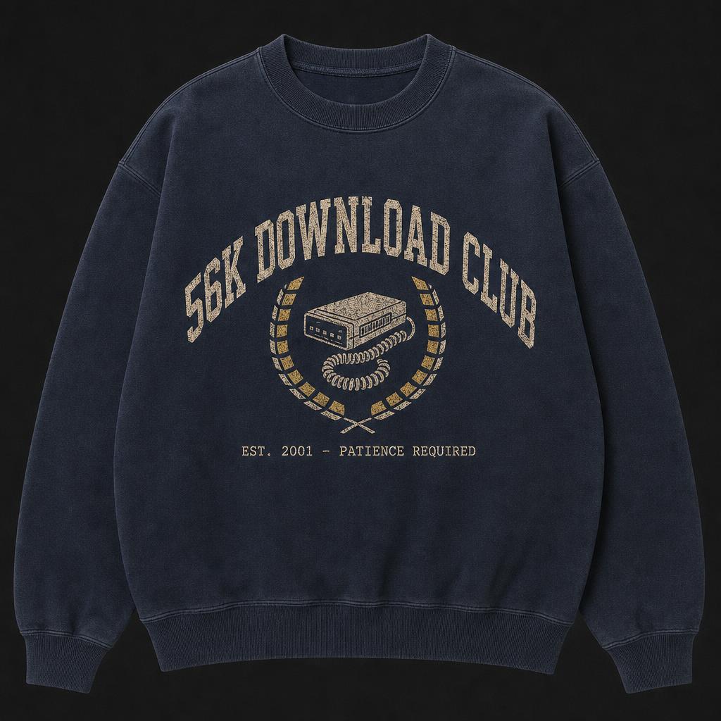 Faded navy crewneck with collegiate arched lettering over a crest of a modem and coiled phone cord framed by a laurel